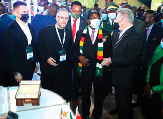 Zingman was seen in Africa again, where he presented the head of Zimbabwe with a BelAZ model